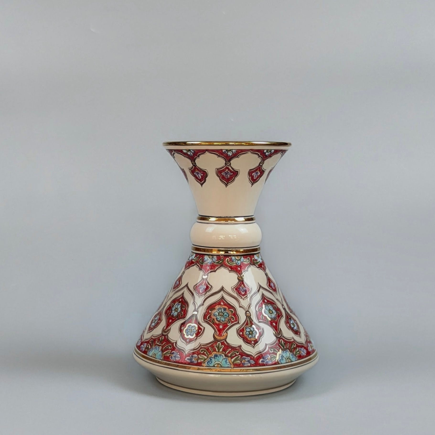 Decorative vase with intricate patterns on a gray background